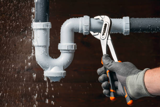 Professional Plumbing technician working in Dedham, MA